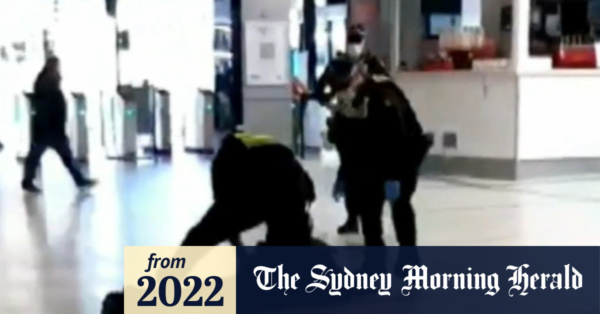 Video Victoria Police officer charged with assault over train station